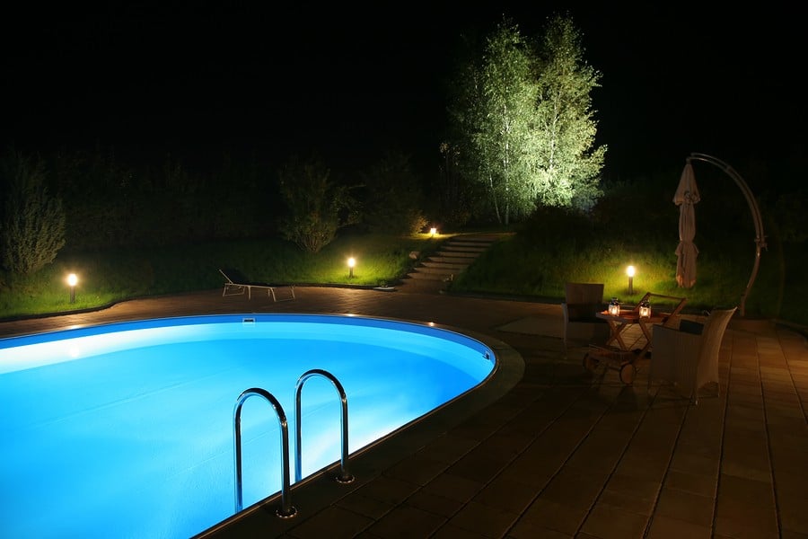 Pool and garden by night