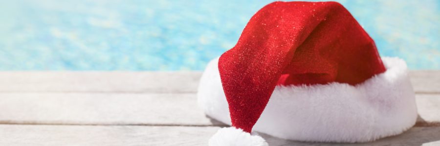 red christmas hat sitting by pool